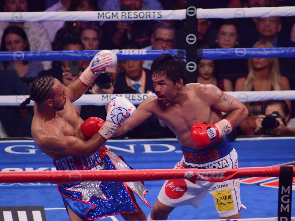 Manny-Pacquiao-Defeats-Father-Time-Whips-Thurman
