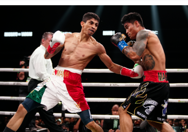 Rey-Vargas-Survives-a-Scare-to-Win-Mark-Magsayo's-Featherweight-Title